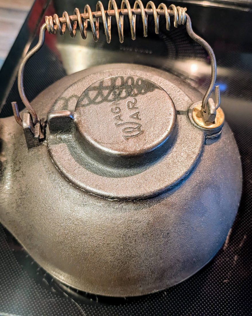 1920s Wagner Ware cast iron tea kettle, after restoration